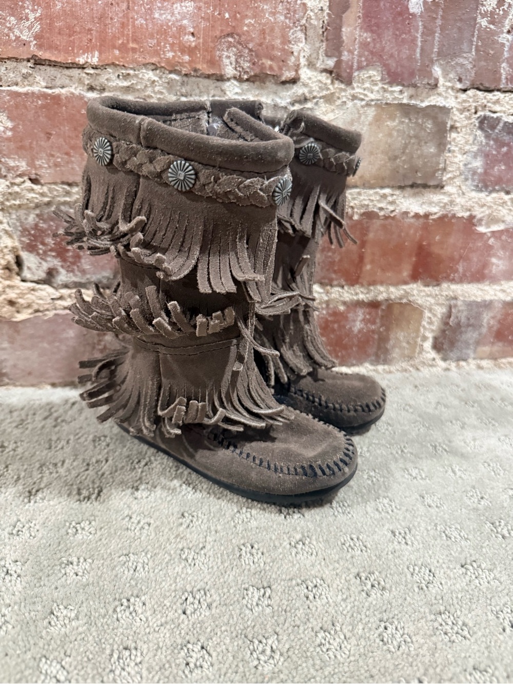 Minnetonka Triple Fringe Suede Moccasin Boots in Grey